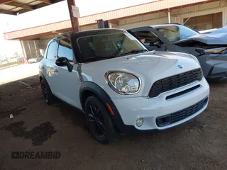 2013 MINI Countryman S with VIN WMWZC3C54DWP24250, listed as a IAAI auction lot 42690827 with 87,353 mi miles and . Bid and sale history available at DreamBid. Image 1.
