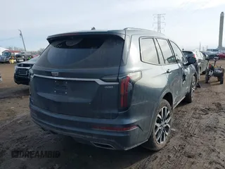 2021 Cadillac XT6 AWD Sport with VIN 1GYKPHRS9MZ104411, listed as a IAAI auction lot 41550524 with 32,140 mi miles. Bid and sale history available at carsss.com. Image 4.