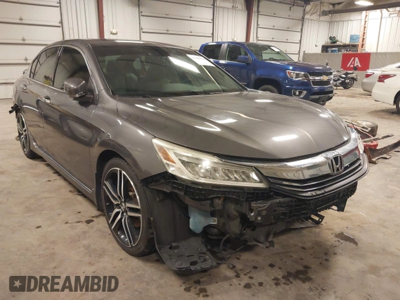 2016 Honda Accord Touring with VIN 1HGCR3F92GA029435, listed as a IAAI auction lot 42180794 with 132,658 mi miles and . Bid and sale history available at DreamBid. Image 1.