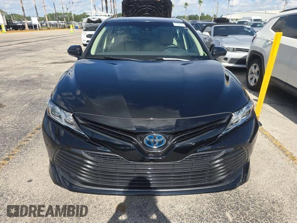 2019 Toyota Camry Hybrid LE z VIN 4T1B31HK0KU511923, wystawiony jako IAAI lot #42566419 z przebiegiem 67 166 mil mil oraz . Historia ofert i sprzedaży dostępna na DreamBid. Obrazek 2.