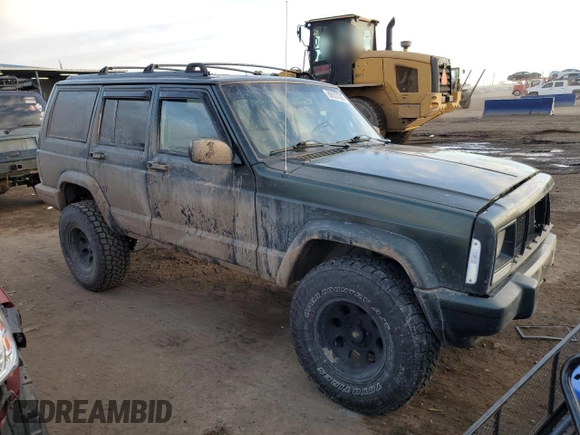 1997 Jeep Cherokee Country with VIN 1J4FJ78SXVL566804, listed as a Copart auction lot 88557395 with 216,230 mi miles and Salvage title. Bid and sale history available at DreamBid. Image 4.