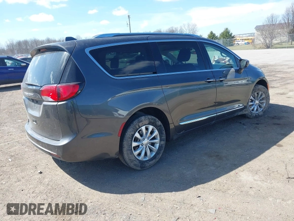 2018 Chrysler Pacifica Touring L with VIN 2C4RC1BGXJR356199, listed as a IAAI auction lot 41886721 with 111,514 mi miles and . Bid and sale history available at DreamBid. Image 4.