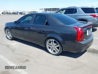 2005 Cadillac CTS with VIN 1G6DP567650227203, listed as a IAAI auction lot 42011203 with 151,683 mi miles. Bid and sale history available at carsss.com. Image 3.