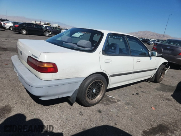 1992 Acura Integra with VIN JH4DB1649NS000455, listed as a Copart auction lot 62386755 with 209,785 mi miles and Salvage title. Bid and sale history available at DreamBid. Image 3.