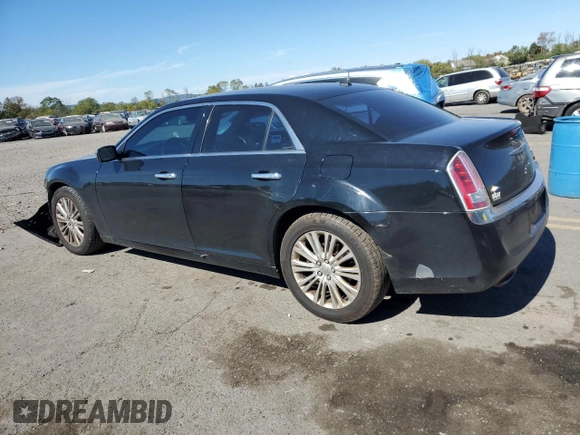 2013 Chrysler 300 C with VIN 2C3CCAKG0DH683117, listed as a Copart auction lot 74812334 with 187,308 mi miles and Salvage Title. Bid and sale history available at DreamBid. Image 2.