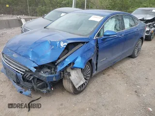 2017 Ford Fusion Hybrid Titanium с VIN 3FA6P0RU5HR388615, выставлен на аукционе IAAI как лот 42066142 с пробегом 121 618 миль миль и . История ставок и продаж доступна на DreamBid. Изображение 17.