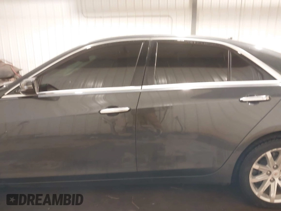 2014 Cadillac CTS Luxury AWD with VIN 1G6AX5S37E0172041, listed as a IAAI auction lot 40343343 with 102,506 mi miles and . Bid and sale history available at DreamBid. Image 14.