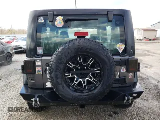 2018 Jeep Wrangler Unlimited Sport S with VIN 1C4BJWDG8JL814090, listed as a Copart auction lot 49155145 with 74,875 mi miles and Salvage Title. Bid and sale history available at DreamBid. Image 6.