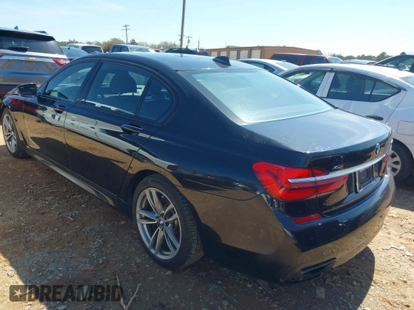 2019 BMW 7 Series 740i xDrive with VIN WBA7E4C57KGV70521, listed as a IAAI auction lot 41881538 with 114,480 mi miles and . Bid and sale history available at DreamBid. Image 3.
