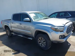 2016 Toyota Tacoma SR5 z VIN 5TFAZ5CN8GX018617, wystawiony jako IAAI lot #42011766 z przebiegiem Nie podano mil oraz . Historia ofert i sprzedaży dostępna na DreamBid. Obrazek 1.