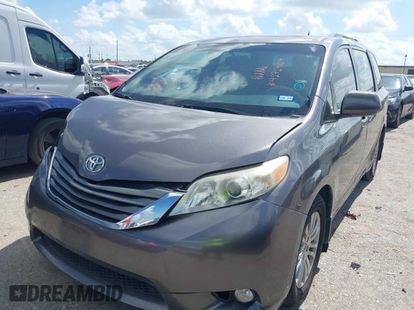 2014 Toyota Sienna XLE with VIN 5TDYK3DC0ES513076, listed as a IAAI auction lot 42724629 with 154,019 mi miles and . Bid and sale history available at DreamBid. Image 17.
