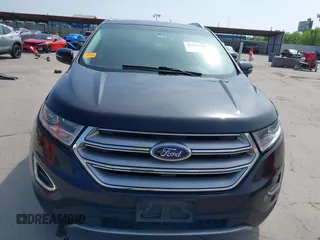 2015 Ford Edge Titanium z VIN 2FMTK3K87FBC06852, wystawiony jako IAAI lot #42335238 z przebiegiem 187 256 mil mil oraz . Historia ofert i sprzedaży dostępna na DreamBid. Obrazek 12.