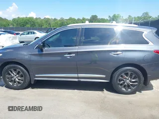 2014 Infiniti QX60 with VIN 5N1AL0MM6EC551107, listed as a IAAI auction lot 42094400 with 161,861 mi miles and . Bid and sale history available at DreamBid. Image 14.