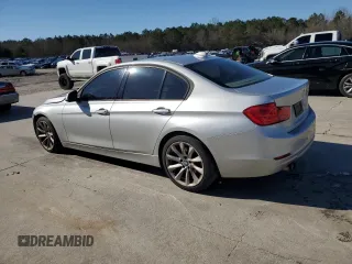 2013 BMW 3 Series 328i with VIN WBA3A5G54DNP26183, listed as a Copart auction lot 88956315 with 200,819 mi miles and Salvage Title. Bid and sale history available at carsss.com. Image 2.