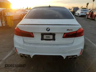 2019 BMW M5 z VIN WBSJF0C53KB284878, wystawiony jako Copart lot #86763564 z przebiegiem Nie podano mil oraz Szkoda całkowita • Salvage title. Historia ofert i sprzedaży dostępna na DreamBid. Obrazek 6.