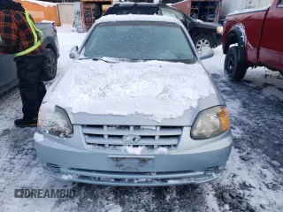 2004 Hyundai Accent GL with VIN KMHCG35C04U314674, listed as a Copart auction lot 86047454 with 65,705 mi miles and Salvage Title. Bid and sale history available at carsss.com. Image 5.