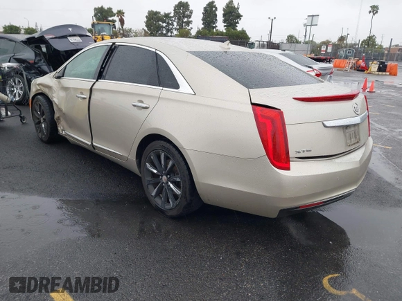 2013 Cadillac XTS z VIN 2G61N5S32D9127146, wystawiony jako IAAI lot #41578528 z przebiegiem 98 529 mil mil oraz . Historia ofert i sprzedaży dostępna na DreamBid. Obrazek 3.
