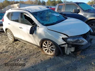 2018 Nissan Rogue S with VIN KNMAT2MT1JP597051, listed as a IAAI auction lot 41814178 with 181,563 mi miles and . Bid and sale history available at carsss.com. Image 1.