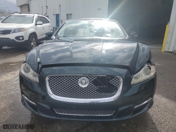 2011 Jaguar XJ with VIN SAJWA2GB2BLV01811, listed as a Copart auction lot 78380094 with 129,243 mi miles and Salvage Title. Bid and sale history available at carsss.com. Image 5.