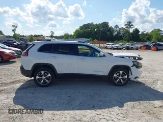 2019 Jeep Cherokee Limited z VIN 1C4PJLDX1KD302882, wystawiony jako IAAI lot #42191309 z przebiegiem 79 426 mil mil oraz . Historia ofert i sprzedaży dostępna na DreamBid. Obrazek 13.