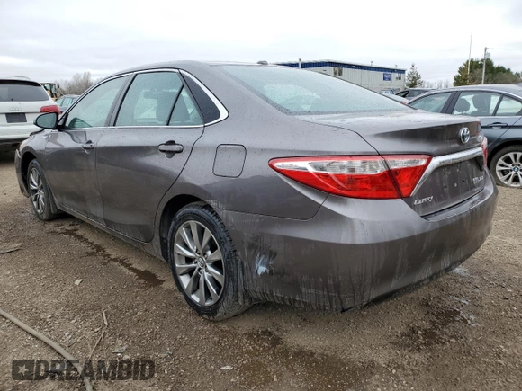 2015 Toyota Camry LE z VIN 4T1BD1FKXFU152666, wystawiony jako Copart lot #54879515 z przebiegiem 315 836 mil mil oraz Czysty tytuł • Clean title. Historia ofert i sprzedaży dostępna na DreamBid. Obrazek 2.