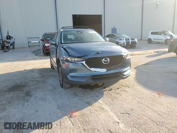 2019 Mazda CX-5 Sport with VIN JM3KFABM5K0676032, listed as a Copart auction lot 52067605 with 59,574 mi miles and Salvage Title. Bid and sale history available at DreamBid. Image 11.