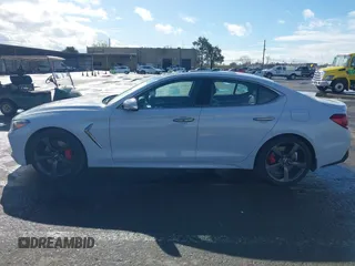 2019 Genesis G70 Dynamic with VIN KMTG34LE2KU032479, listed as a IAAI auction lot 41561604 with 68,098 mi miles and . Bid and sale history available at DreamBid. Image 14.