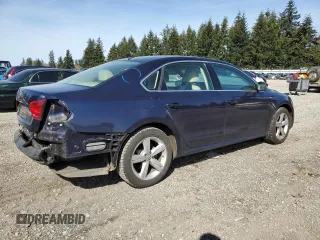 2014 Volkswagen Passat Wolfsburg Edition z VIN 1VWAT7A32EC036093, wystawiony jako Copart lot #52129185 z przebiegiem 106 949 mil mil oraz Szkoda całkowita • Salvage title. Historia ofert i sprzedaży dostępna na DreamBid. Obrazek 3.