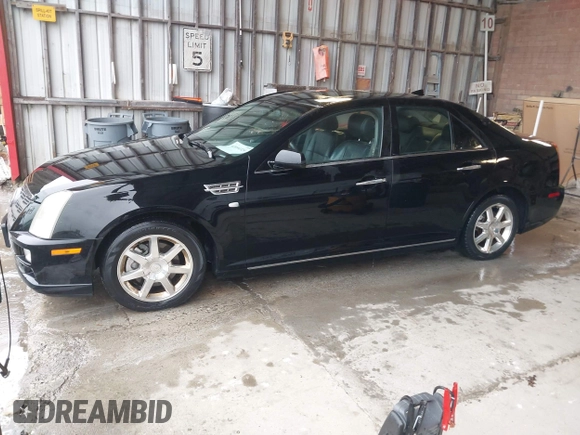 2011 Cadillac STS RWD w/1SB with VIN 1G6DW6ED1B0121186, listed as a IAAI auction lot 42094324 with 101,886 mi miles. Bid and sale history available at carsss.com. Image 2.