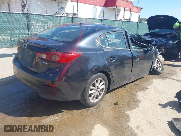 2015 Mazda Mazda3 i Touring with VIN 3MZBM1V77FM126870, listed as a IAAI auction lot 40547647 with 146,901 mi miles. Bid and sale history available at carsss.com. Image 4.