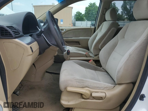 2009 Honda Odyssey LX z VIN 5FNRL38259B050624, wystawiony jako Copart lot #57357605 z przebiegiem 232 991 mil mil oraz Czysty tytuł • Clean title. Historia ofert i sprzedaży dostępna na DreamBid. Obrazek 7.