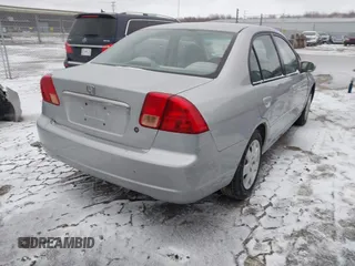 2001 Honda Civic EX with VIN 2HGES26751H522623, listed as a IAAI auction lot 41722598 with 209,912 mi miles and . Bid and sale history available at DreamBid. Image 4.