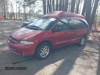 2000 Dodge Grand Caravan with VIN 1B4GT44L4YB570744, listed as a IAAI auction lot 41934100 with 174,579 mi miles and . Bid and sale history available at DreamBid. Image 2.
