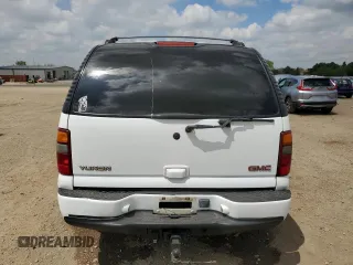 2003 GMC Yukon Denali z VIN 1GKEK63U33J316027, wystawiony jako Copart lot #56869815 z przebiegiem 200 916 mil mil oraz Szkoda całkowita • Salvage title. Historia ofert i sprzedaży dostępna na DreamBid. Obrazek 6.
