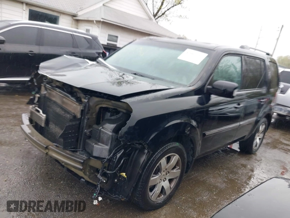 2014 Honda Pilot Touring with VIN 5FNYF4H91EB055741, listed as a IAAI auction lot 42006752 with 222,308 mi miles and . Bid and sale history available at carsss.com. Image 18.