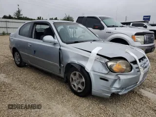 2005 Hyundai Accent GLS with VIN KMHCG35C75U354574, listed as a Copart auction lot 74931444 with 141,013 mi miles and Salvage Title. Bid and sale history available at carsss.com. Image 4.