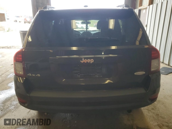 2014 Jeep Compass Latitude with VIN 1C4NJDEB1ED661332, listed as a Copart auction lot 53958985 with 116,020 mi miles and Salvage Title. Bid and sale history available at DreamBid. Image 6.