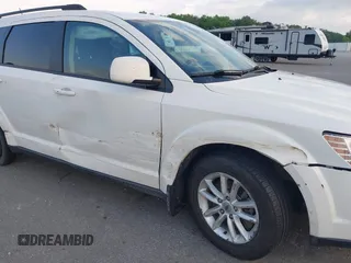 2018 Dodge Journey SXT with VIN 3C4PDCBG4JT369687, listed as a IAAI auction lot 42269696 with 131,306 mi miles and . Bid and sale history available at DreamBid. Image 6.
