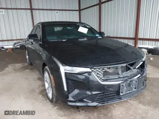 2021 Cadillac CT4 Luxury with VIN 1G6DJ5RK6M0121351, listed as a IAAI auction lot 41197209 with 71,186 mi miles. Bid and sale history available at carsss.com. Image 1.