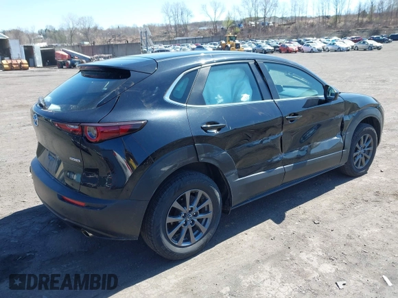 2021 Mazda CX-30 S with VIN 3MVDMBAL3MM214735, listed as a IAAI auction lot 42000096 with 46,794 mi miles and . Bid and sale history available at DreamBid. Image 4.
