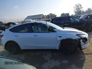2023 Tesla Model Y Performance with VIN 7SAYGDEF0PF839468, listed as a IAAI auction lot 41609263 with 25,434 mi miles and . Bid and sale history available at DreamBid. Image 14.