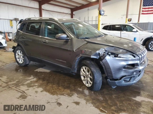 2015 Jeep Cherokee Latitude with VIN 1C4PJMCS0FW550661, listed as a Copart auction lot 56456315 with 62,205 mi miles and Salvage Title. Bid and sale history available at DreamBid. Image 4.
