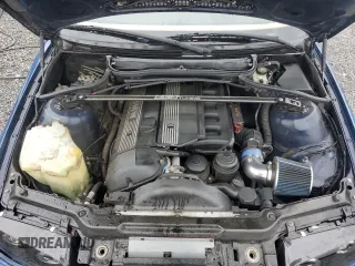 2000 BMW 3 Series 323i with VIN WBAAM3347YCA92579, listed as a Copart auction lot 60823235 with 216,510 mi miles and Salvage title. Bid and sale history available at DreamBid. Image 11.