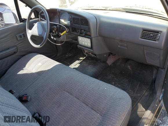 1994 Toyota Pickup DLX z VIN 4TARN81P2RZ175695, wystawiony jako Copart lot #50415385 z przebiegiem 258 048 mil mil oraz Szkoda całkowita • Salvage title. Historia ofert i sprzedaży dostępna na DreamBid. Obrazek 8.