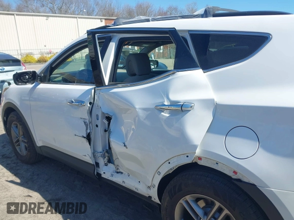 2017 Hyundai Santa Fe 2.4L z VIN 5NMZUDLB9HH028990, wystawiony jako IAAI lot #42055991 z przebiegiem 91 569 mil mil oraz . Historia ofert i sprzedaży dostępna na DreamBid. Obrazek 6.