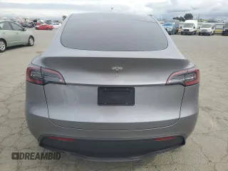 2025 Tesla Model Y Long Range with VIN 7SAYGDED7SF227582, listed as a Copart auction lot 47556595 with 5,340 mi miles and Salvage Title. Bid and sale history available at DreamBid. Image 6.
