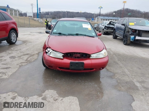 1998 Ford Contour z VIN 1FAFP6531WK303884, wystawiony jako IAAI lot #41532006 z przebiegiem 110 001 mil mil oraz . Historia ofert i sprzedaży dostępna na DreamBid. Obrazek 12.