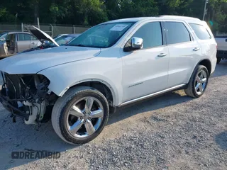 2013 Dodge Durango Citadel with VIN 1C4SDJET6DC652552, listed as a IAAI auction lot 42602746 with 163,602 mi miles and . Bid and sale history available at DreamBid. Image 2.