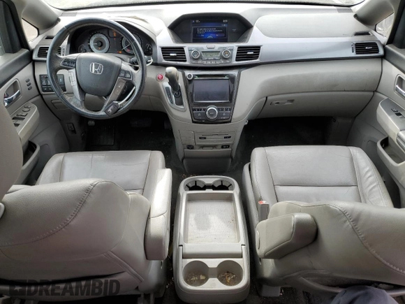 2014 Honda Odyssey Touring с VIN 5FNRL5H98EB029561, выставлен на аукционе Copart как лот 57349265 с пробегом 136 233 миль миль и Списание • Salvage title. История ставок и продаж доступна на DreamBid. Изображение 8.