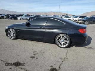 2014 BMW 4 Series 428i with VIN WBA3N7C50EF719927, listed as a Copart auction lot 86313054 with 123,727 mi miles and Salvage Title. Bid and sale history available at DreamBid. Image 2.